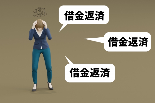 お金を手に頭を抱える。坂井市で債務整理の無料相談ができます